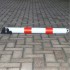 Red & White 76 mm Diameter Fold Down Parking Post (laying down).