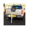 900W-(76), Fold Down Parking Bollard (mounted behind a large vehicle).
